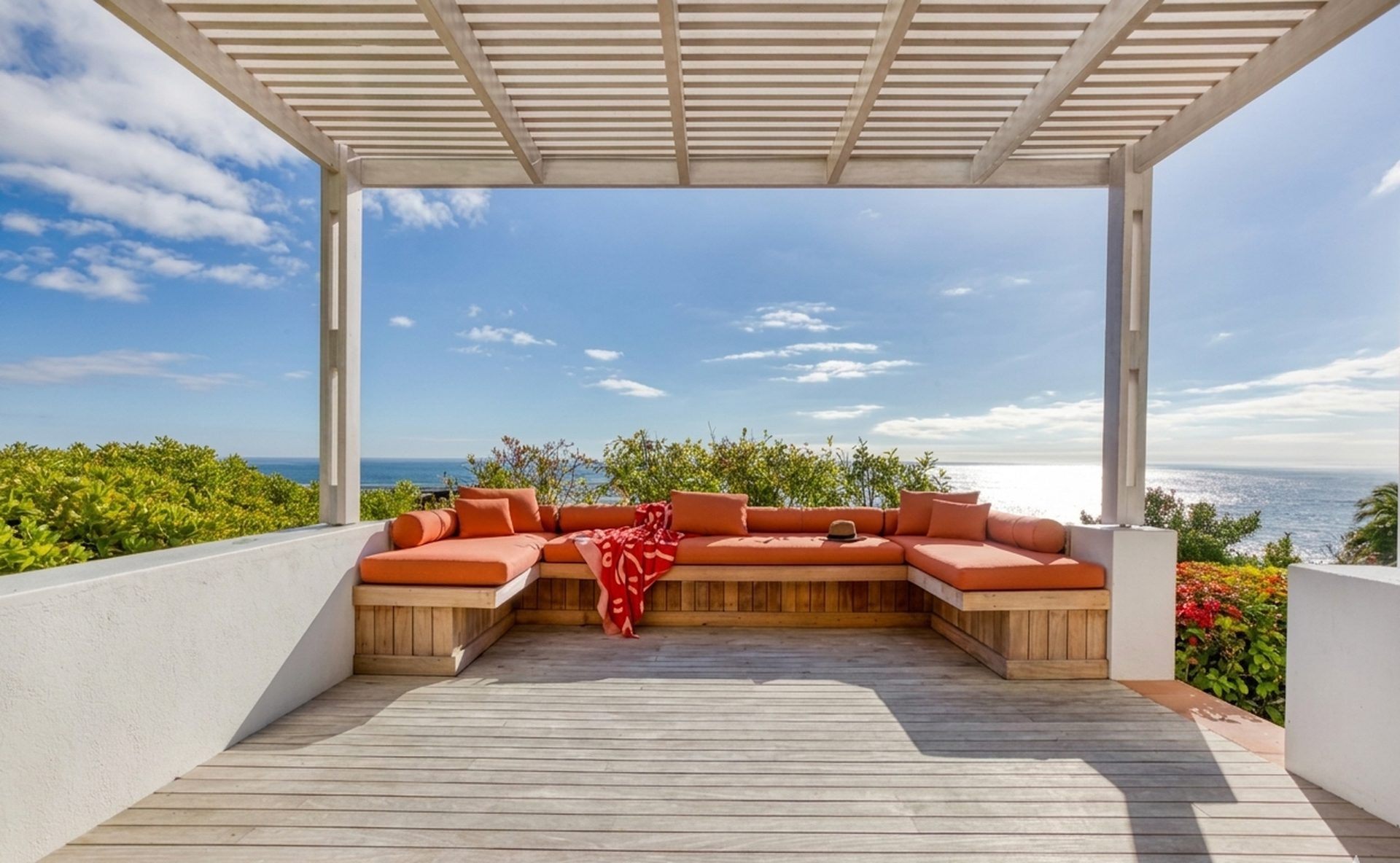 Bespoke Cape Town timber pergola and ocean-view deck with master-crafted hardwood